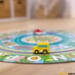 Kép 2/6 - Melissa &amp; Doug kerek puzzle felhúzhatós sárga busszal